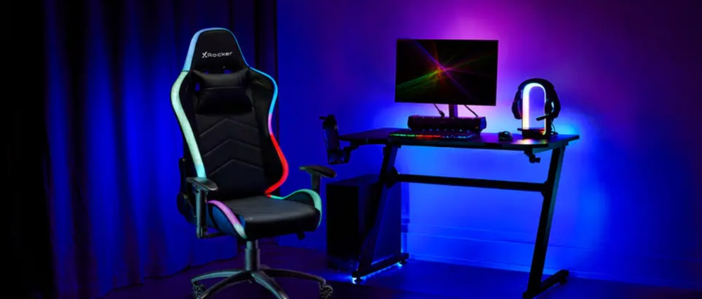 X-Rocker Strike RGC Gaming Chair with LED lights as part of a gaming set up.